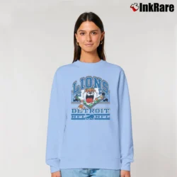 Women’s NFL Detroit Lions Taz Looney Tunes Football Relaxed Sweatshirt in light blue | Soft, Laid-Back Vibe