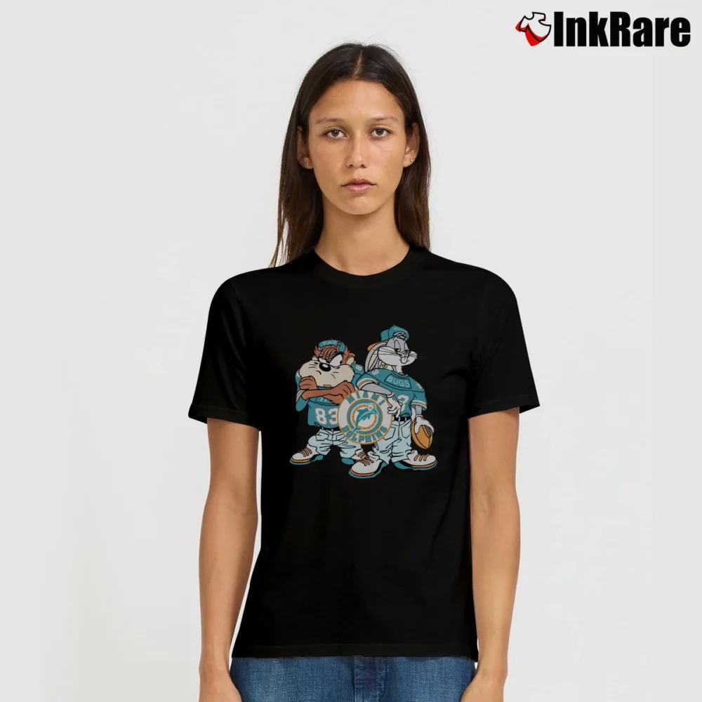 Women’s NFL Miami Dolphins Looney Tunes Football Fan Signature T-Shirt in black | Soft, Flattering Fit