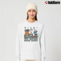 Women’s NFL Miami Dolphins Looney Tunes Football Long-Sleeve Top in white | Sleek, Versatile, All-Season