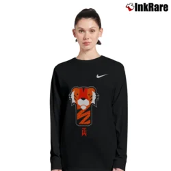 Women’s Nike Golf TW Tiger Woods Frank Long-Sleeve Top in black | Sleek, Versatile, All-Season