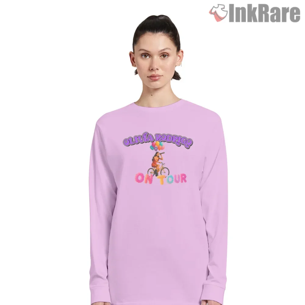 Olivia Rodrigo On Tour Bike And Balloons Retro Shirt on light pink long sleeve shirt for women graphic tee