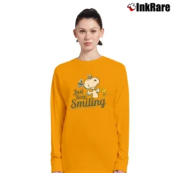 Women’s Peanuts Snoopy Just Keep Smiling Long-Sleeve Top in orange | Sleek, Versatile, All-Season