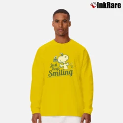 Men’s Peanuts Snoopy Just Keep Smiling Long-Sleeve Shirt in yellow | Sleek, Lightweight, Year-Round Wear