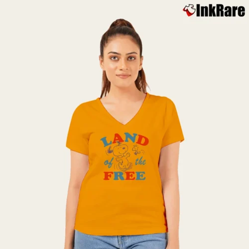 Women’s Peanuts Snoopy Land Of The Free V-Neck Tee in orange | Chic Neckline, Soft Texture