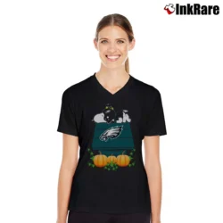 Women’s Philadelphia Eagles Snoopy Pumpkin House V-Neck Tee in black | Chic Neckline, Soft Texture