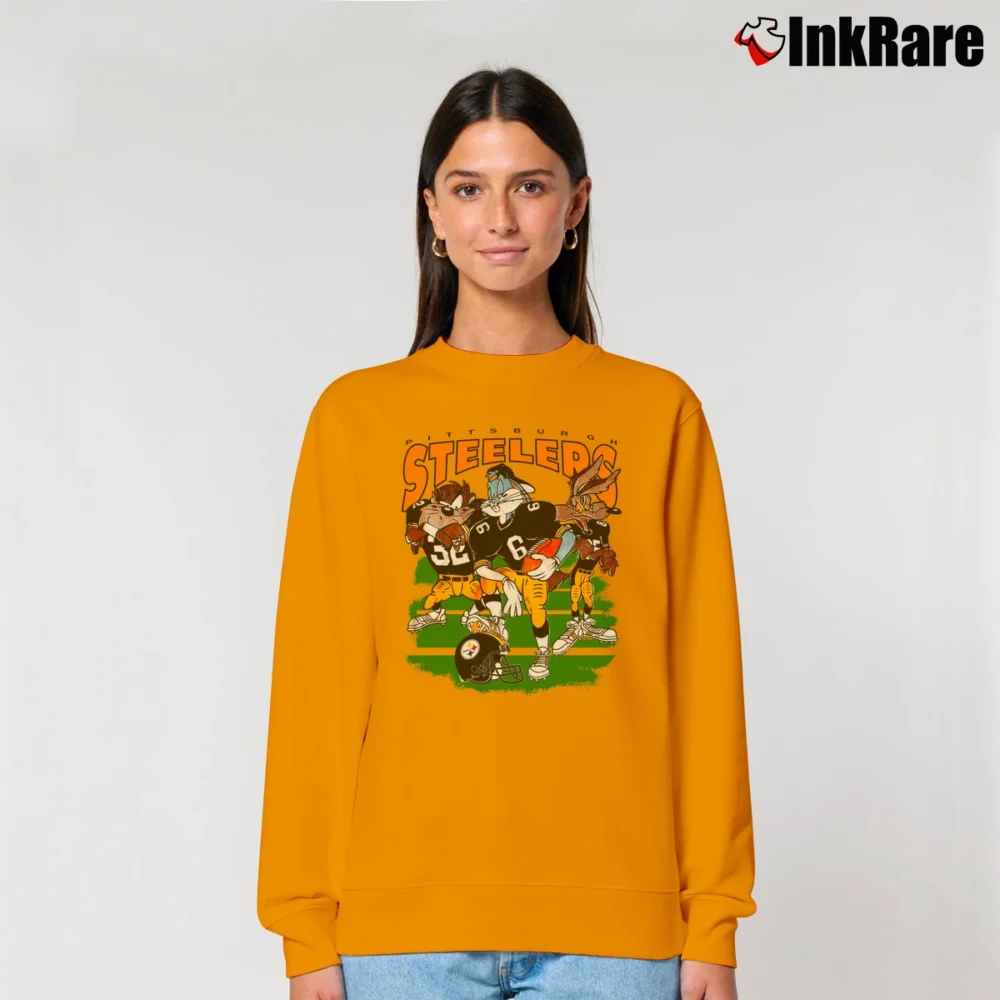 Women’s Pittsburgh Steelers Looney Tunes NFL Cartoon Relaxed Sweatshirt in orange | Soft, Laid-Back Vibe
