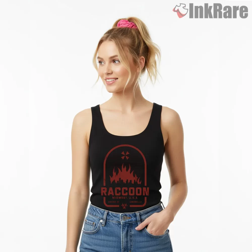 Resident Evil House Of Umbrella Raccoon Emblem Shirt on black tank top for women graphic tee