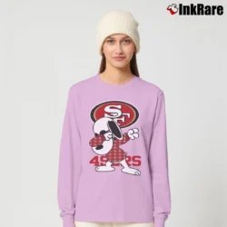 Women’s San Francisco 49ers Snoopy Dabbing Long-Sleeve Top in light pink | Sleek, Versatile, All-Season