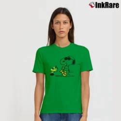 Women’s Saxophone Snoopy Woodstock Peanuts Jazz Signature T-Shirt in irish green | Soft, Flattering Fit