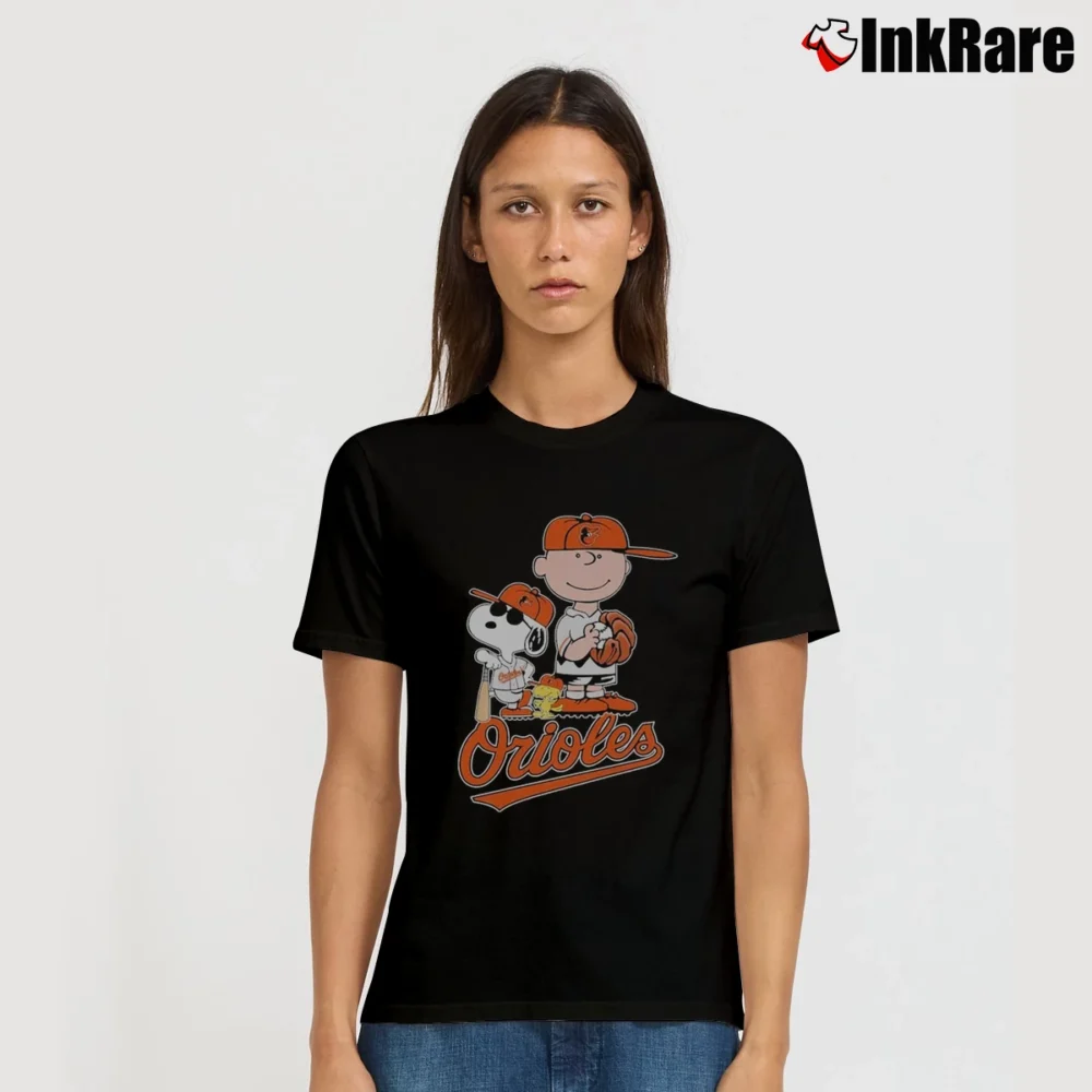 Women’s Snoopy And Charlie Brown Woodstock Baltimore Orioles T-Shirt in black | Soft, Flattering Fit