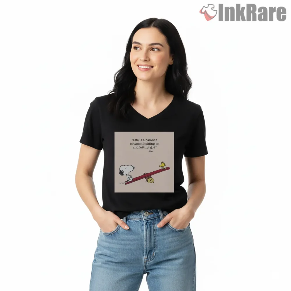 Snoopy And Woodstock Life Balance Seesaw Shirt on black v-neck shirt for women graphic tee