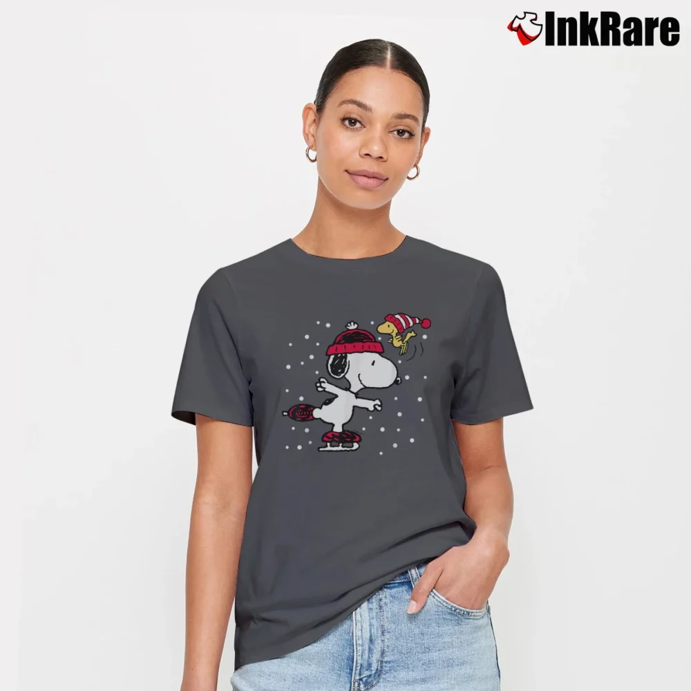 Women’s Snoopy And Woodstock Winter Skating Christmas Signature T-Shirt in charcoal | Soft, Flattering Fit