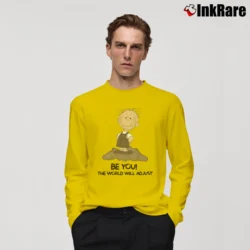 Men’s Snoopy Charlie Brown Be You The World Will Adjust Long-Sleeve Shirt in yellow | Sleek, Lightweight, Year-Round Wear