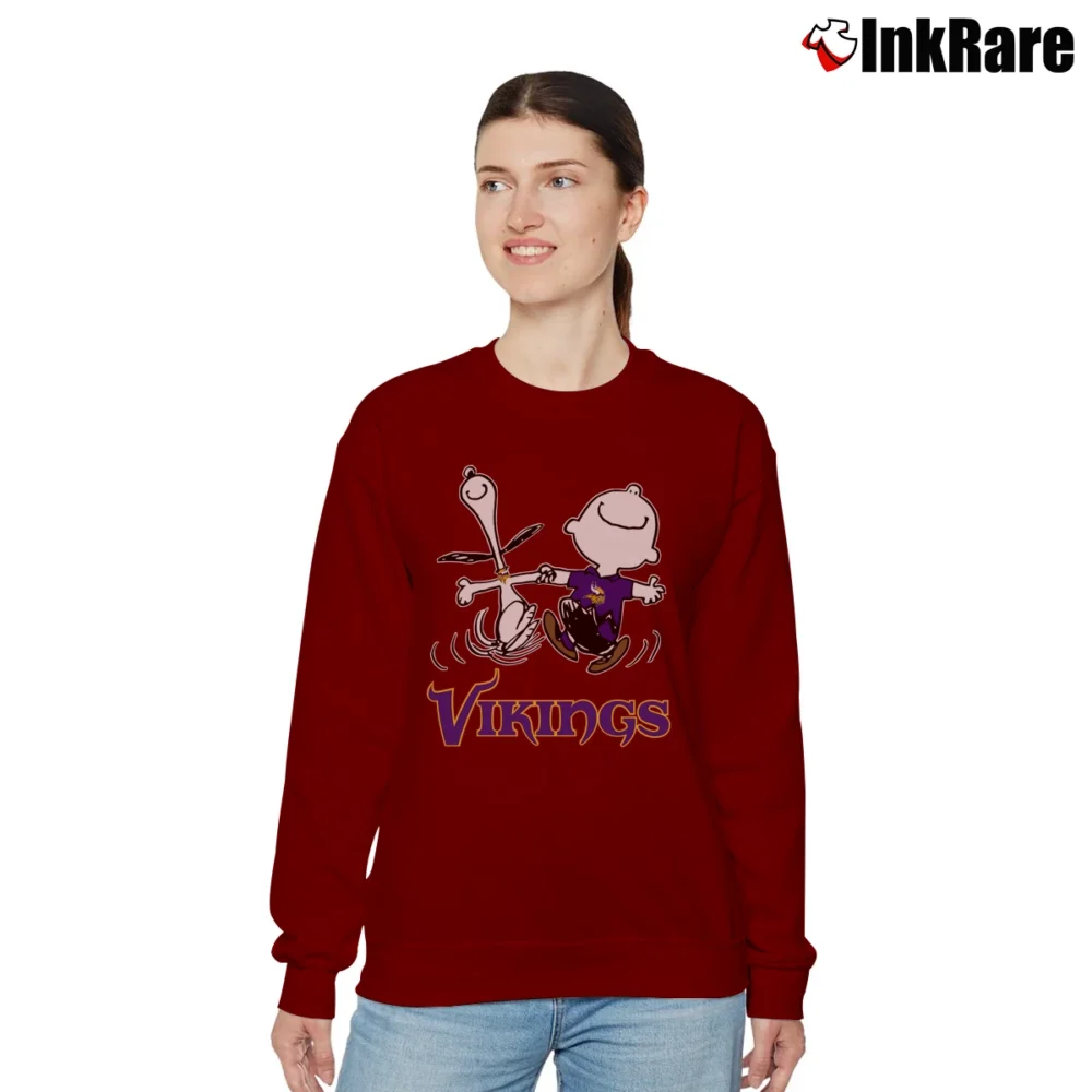 Women’s Snoopy Charlie Brown Happy Minnesota Vikings Fans Relaxed Sweatshirt in maroon | Soft, Laid-Back Vibe