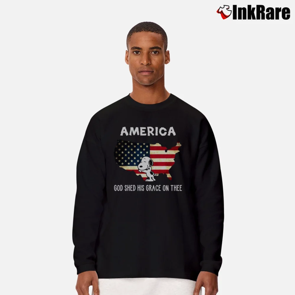 Men’s Snoopy Hugs America Flag God Shed His Grace On Thee 4th Of July Long-Sleeve Shirt in black | Sleek, Lightweight, Year-Round Wear