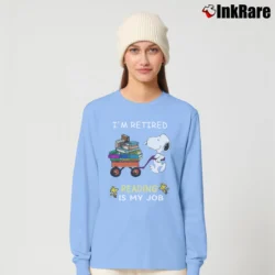 Women’s Snoopy I'm Retired Reading Is My Job Long-Sleeve Top in light blue | Sleek, Versatile, All-Season