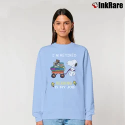 Women’s Snoopy I'm Retired Reading Is My Job Relaxed Sweatshirt in light blue | Soft, Laid-Back Vibe