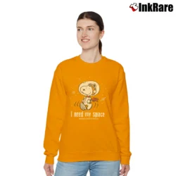 Women’s Snoopy Kennedy Space Center I Need My Space Relaxed Sweatshirt in orange | Soft, Laid-Back Vibe