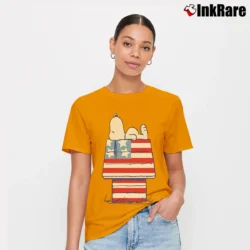 Women’s Snoopy Peanuts American Flag House Signature T-Shirt in orange | Soft, Flattering Fit