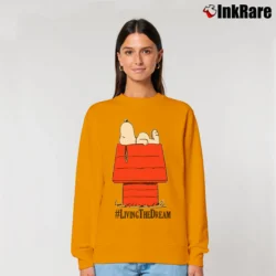 Women’s Snoopy Peanuts Living The Dream Classic Relaxed Sweatshirt in orange | Soft, Laid-Back Vibe