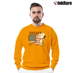 Men’s Snoopy Since 1950 American Flag Cartoon Crewneck Sweatshirt in orange | Cozy Fabric, Clean Style