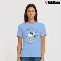 Women’s Snoopy Somebody Loves You Cartoon Network Peanuts Signature T-Shirt in light blue | Soft, Flattering Fit