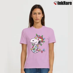 Women’s Snoopy Wrapped In Christmas Lights Classic Signature T-Shirt in light pink | Soft, Flattering Fit
