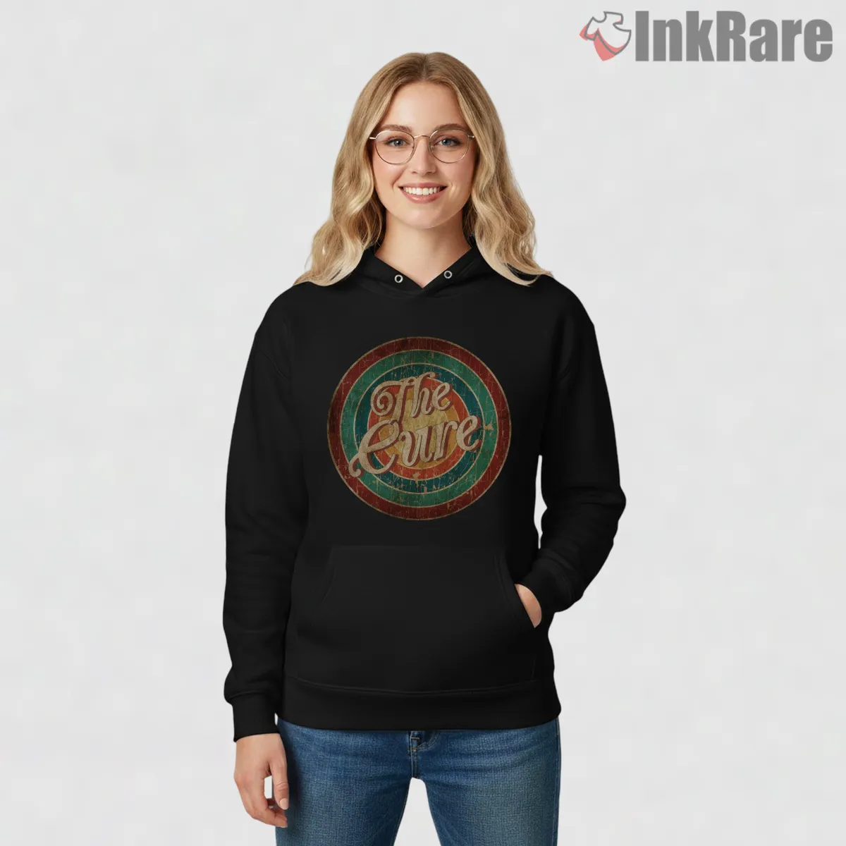 The Cure Distressed Retro Circle Logo Shirt on black hoodie for women graphic tee