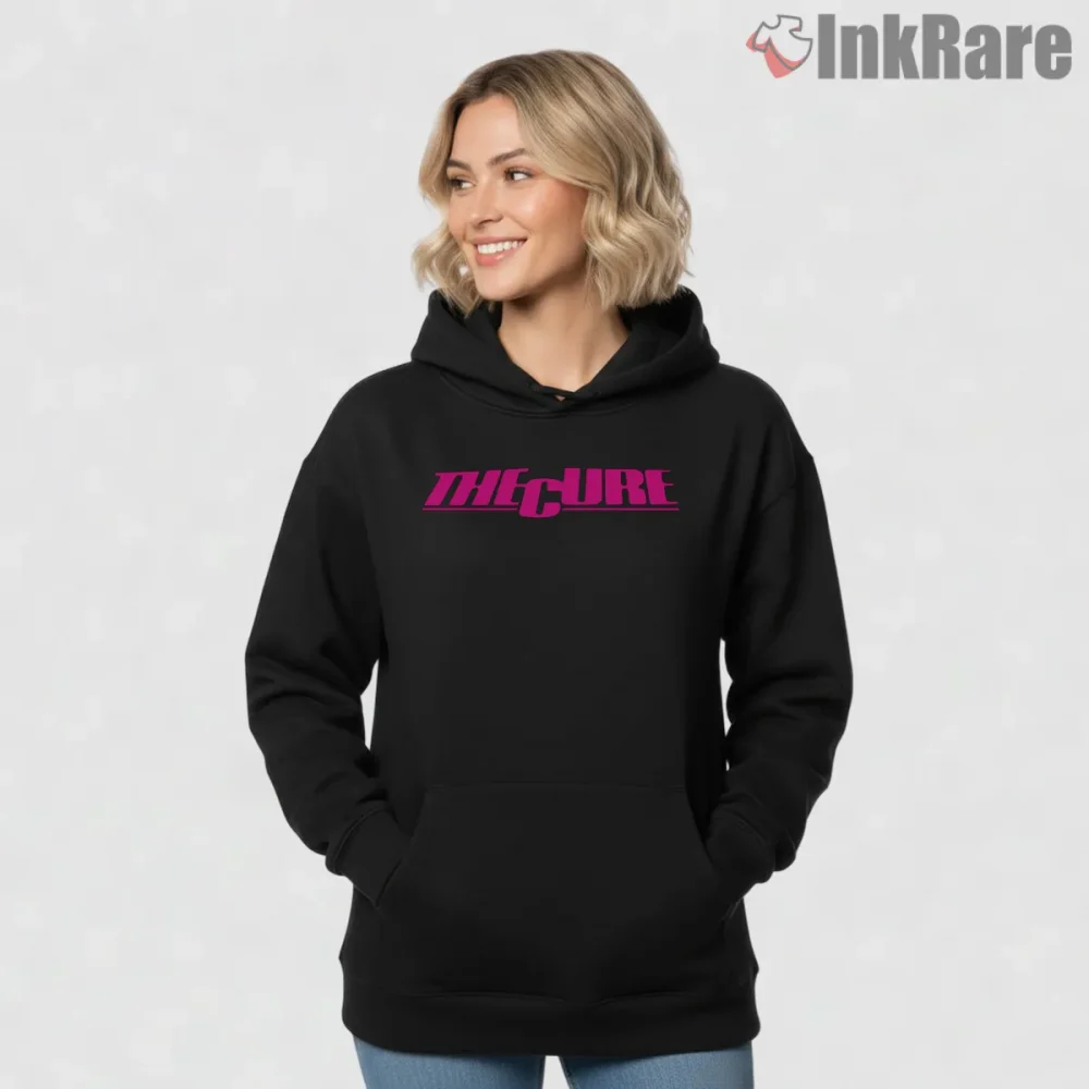 The Cure Neon Pink Minimal Logo Shirt on black hoodie for women graphic tee