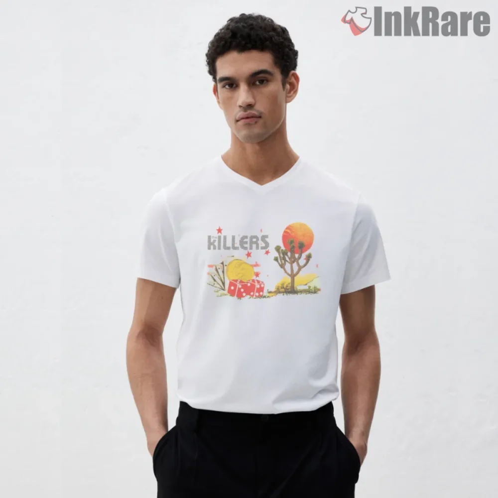 White V neck shirt with The Killers desert graphic featuring Joshua tree, red sun, dice, coins, and stars