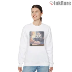 White women sweatshirt featuring The Killers Imploding the Mirage album art with pastel cloudscape and figures