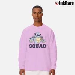 Men’s The Squirtle Squad Pokemon Go Graphic Long-Sleeve Shirt in light pink | Sleek, Lightweight, Year-Round Wear