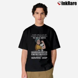 Men’s There Are A Lot Of People In The World To Mess With My Granddaughter Snoopy Is The One Person You May Wanna Skip Classic T-Shirt in black | Soft, Breathable Everyday Wear