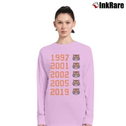 Women’s Tiger Woods 2019 Masters Champion Graphic Long-Sleeve Top in light pink | Sleek, Versatile, All-Season