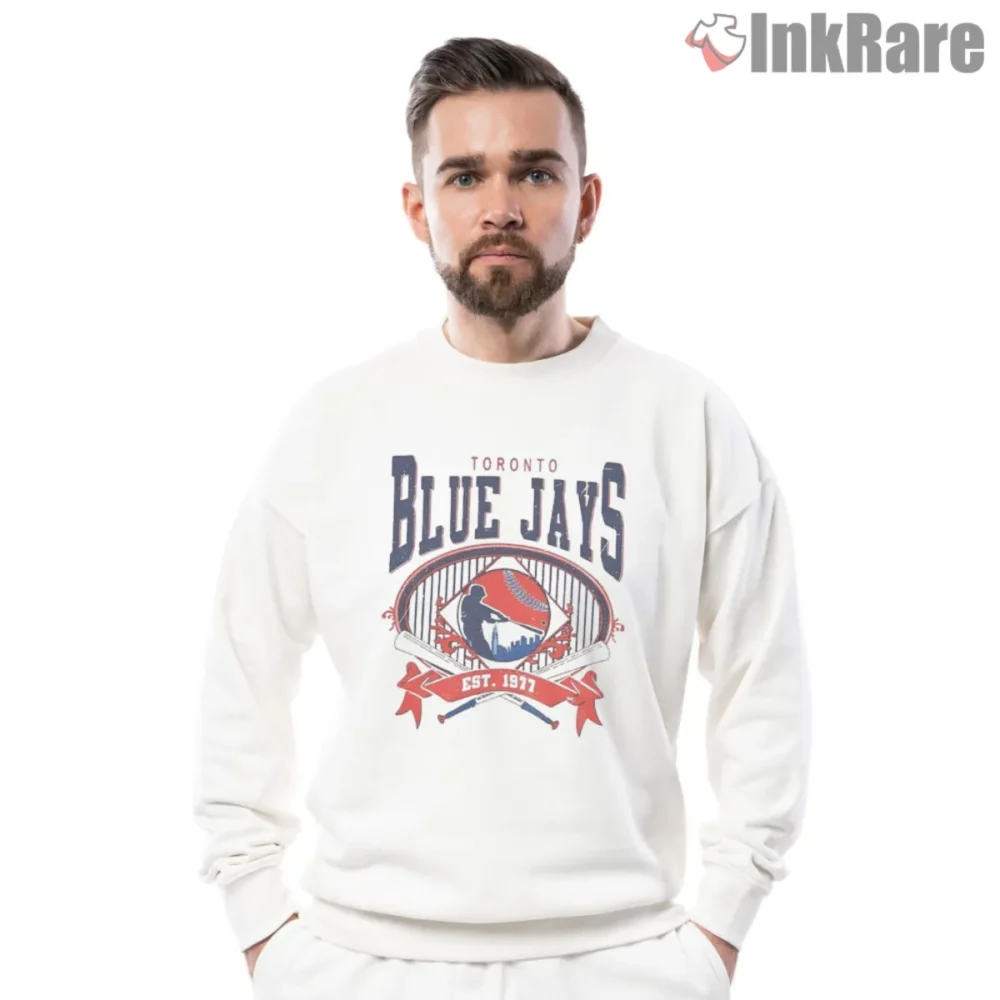Toronto Blue Jays Est 1977 Shirt front graphic in team colors on white sweatshirt
