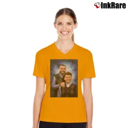 Women’s Travis Kelce Patrick Mahomes Stepbrothers Poster V-Neck Tee in orange | Chic Neckline, Soft Texture