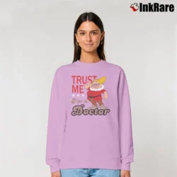 Women’s Trust Me I'm A Doctor Doc Snow And The Seven Dwarf Disney Park Walt Disney World Character Relaxed Sweatshirt in light pink | Soft, Laid-Back Vibe