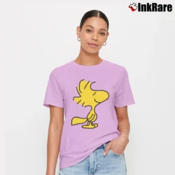 Women’s Woodstock Snoopy Charlie Brown Peanuts Signature T-Shirt in light pink | Soft, Flattering Fit